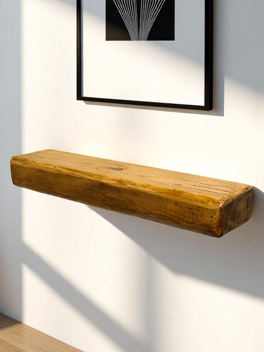 Reclaimed wood fireplace mantel shelf mounted above a UK fireplace