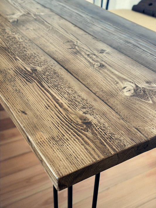Rustic reclaimed wood dining table with benches in UK home